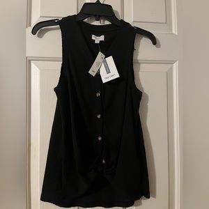 TRUECRAFT black no-sleeve top.